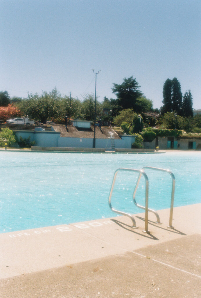 Blue sky turquoise empty pool 